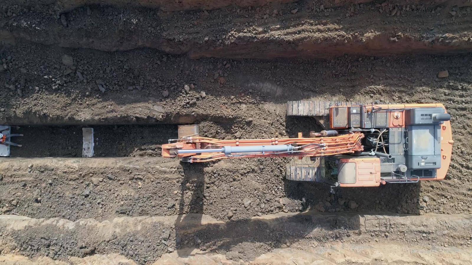 Tracked drilling rig working in a quarry